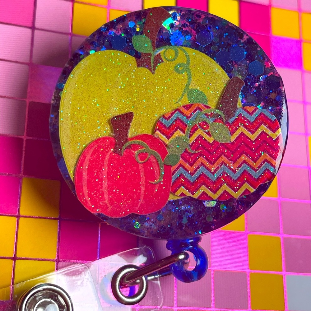 Pumpkin and glitter badge reel